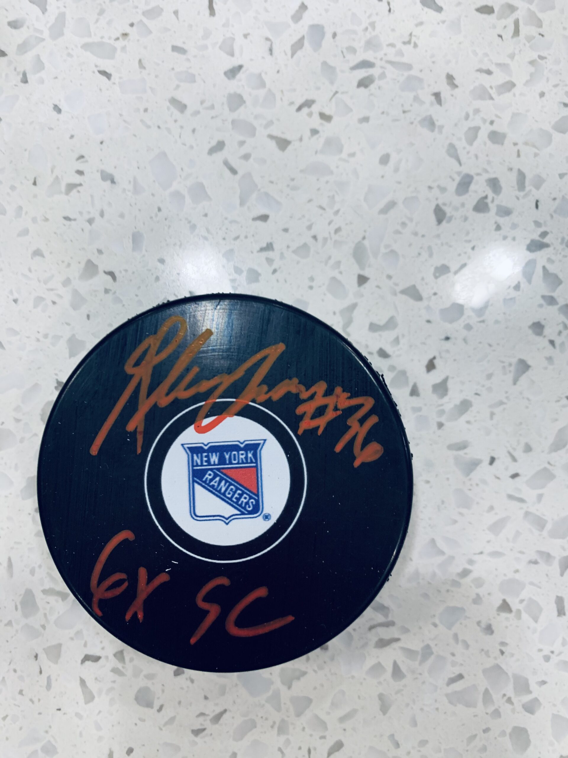 Glenn Anderson signed puck - sports collectibles and memorabilia